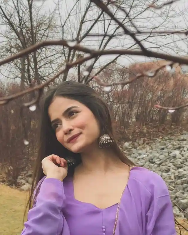 Girl getting a hair cut in amisha beauty care agra